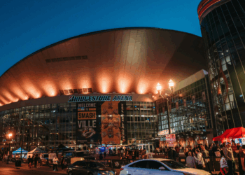 Cars driving around Nashville, TN at night